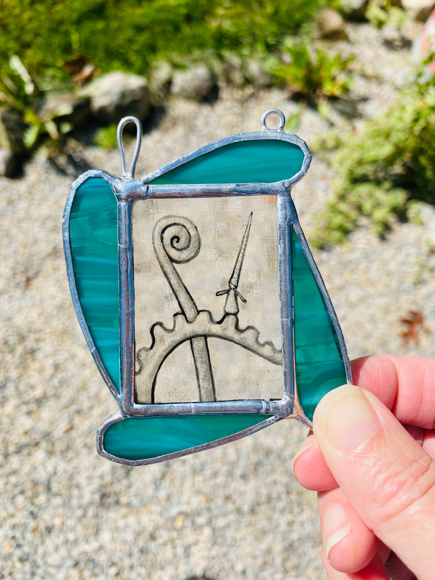 A Cog Among The Weeds in Teal